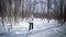 Woman Cross-Country Skiing Alone in Nature