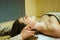 A woman at a CST treatment session, Osteopathic Manipulation and CranioSacral Therapy 3