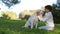 Woman cuddling with senior labrador dog