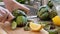 Woman cut artichokes. Cooking process