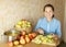 Woman cuts apples for apple jam