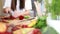 Woman cutting beetroot with knife