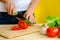 Woman cutting tomato fresh tomatos