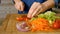 Woman cutting vegetables