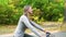 Woman on cycle ride with family in park