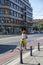 Woman cycling on the street of Wroclaw, Poland