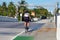 Woman cyclist on the Venetia Causeway i