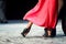 Woman dancing Argentinian tango in red dress