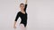 Woman dancing gracefully in ballet studio