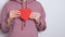 Woman dancing and hugging a red heart. Trendy video banner for Valentines Day, International Womens Day or mothers day