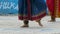 Woman dancing indian dance with bells on her legs