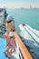 Woman and daughter standing on deck of ship