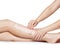 Woman depilating legs by waxing