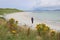 Woman on deserted beach