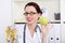 Woman dietician holding apple and measuring tape