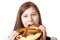 Woman in Dirndl eating Oktoberfest Pretzel