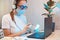 Woman disinfects the surface of the phone