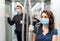 Woman in disposable mask in subway train