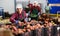 Woman distributes potatoes into boxes in a warehouse of vegetable factory