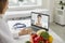 Woman doctor nutritiologist communicating with female patient online during videocall