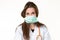 Woman doctor puts on surgery mask protective coronavirus