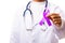 Woman doctor white uniform hold purple ribbon on hand