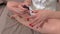 Woman does manicure close up