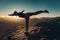 Woman does yoga exercises on cliff on Mount Sinai against background of sunrise.