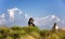 Woman and dog at Poon Hill in Himalayas