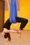 Woman doing anti gravity Aerial yoga