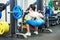 Woman doing exercise in gym