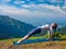 Woman doing Hatha yoga asana Purvottanasana