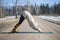 Woman doing hatha yoga outdoor