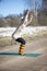 Woman doing hatha yoga outdoor