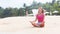 Woman doing meditation near the ocean beach. Yoga silhouette.