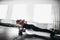 Woman doing push-ups exercises on kettlebells. Cross fit training