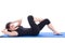 Woman doing strength exercises for abdominal muscles isolated on