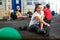 Woman Doing Stretching Exercise At Cross Training