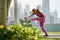 Woman Doing Stretching Before Sports Training At Morning