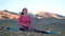 Woman Doing Yoga Fitness Exercise by Mountains