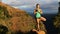 Woman doing yoga in Hawaii mountains meditating