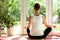 Woman doing yoga at home