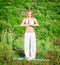 Woman doing yoga outdoors