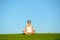 Woman doing yoga relaxing outdoor