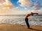 Woman doing yoga Sun salutation Surya Namaskar