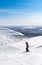 Woman downhill skiing in Lapland Finland