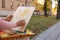 Woman drawing with soft pastels on street, closeup