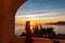 Woman in dress with view from a luxury apartment on the Mediterranean Sea in Praiano, Amalfi Coast, Campania, Italy, Europe.