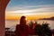 Woman in dress with view from a luxury apartment on the Mediterranean Sea in Praiano, Amalfi Coast, Campania, Italy, Europe.