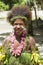 Woman dressed in flowers and leaves, Solomon Islands